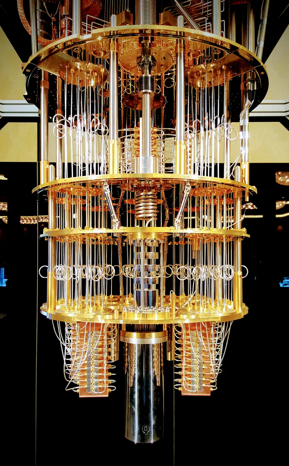 Gold-colored cryogenic hardware from an IBM quantum-computer prototype displayed at CES 2018.